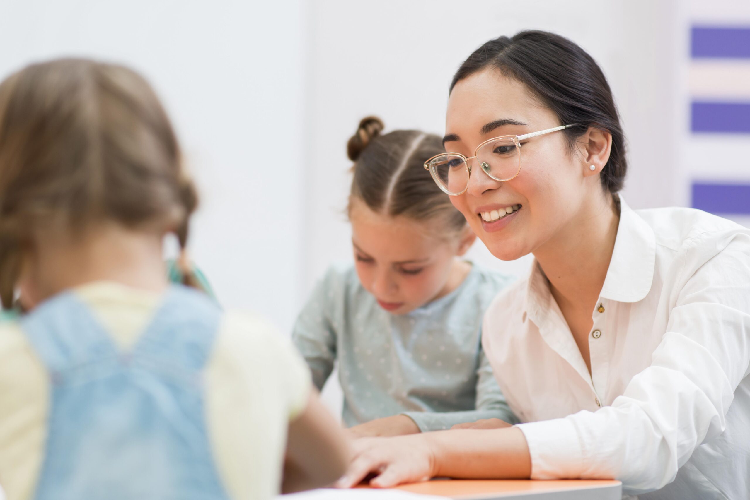 woman-talking-with-her-students-class